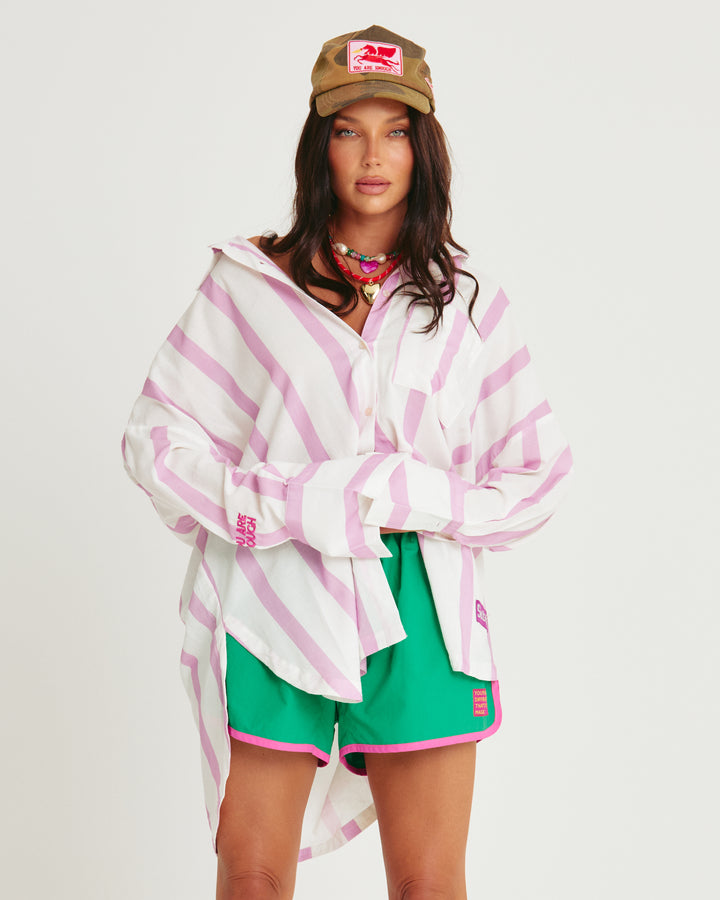 Person standing in photo studio wearing watercolour Don Julio Shirt