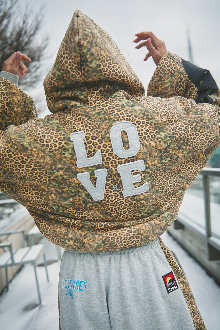 THE BE HAPPY LEOPARD PADDED BOMBER