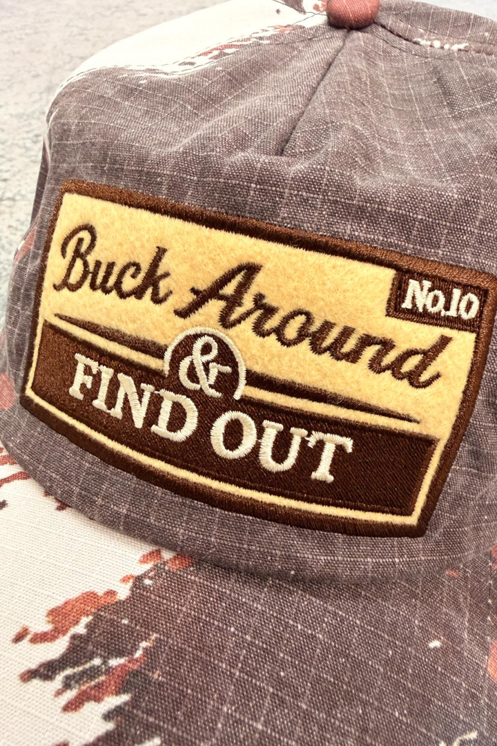 THE BUCK AROUND COW CAP