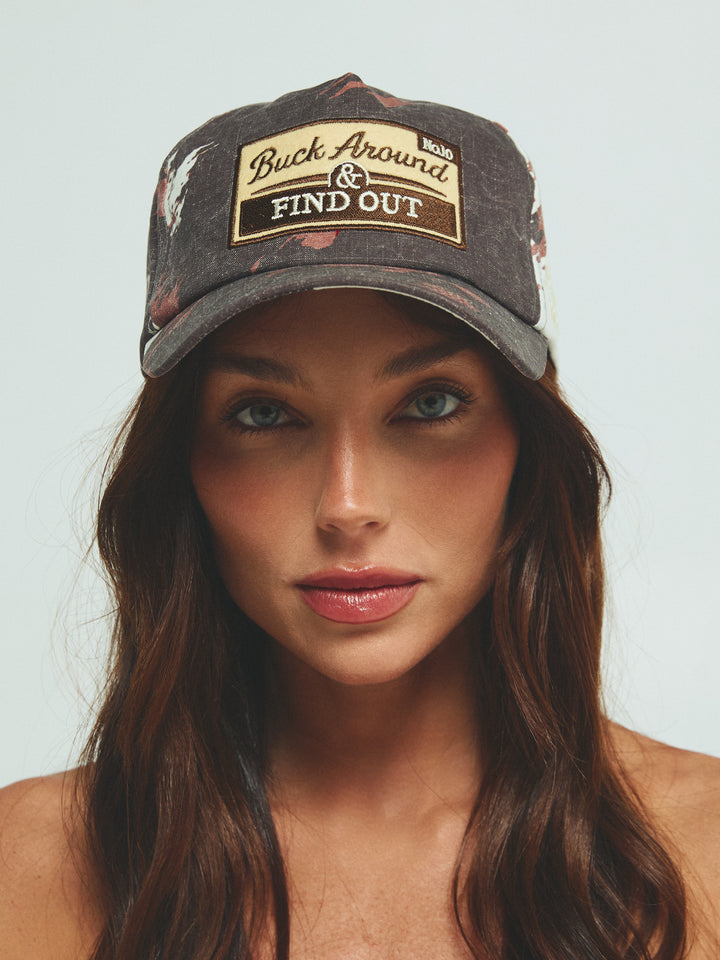 THE BUCK AROUND COW CAP