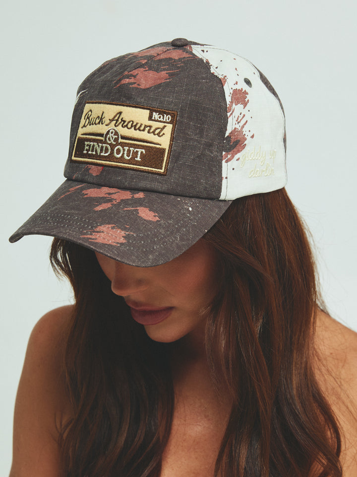 THE BUCK AROUND COW CAP