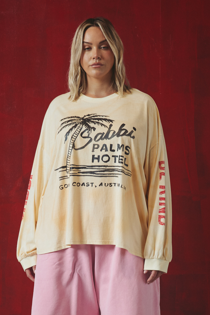 THE PALMS HOTEL LONG SLEEVE TEE - PASTEL PEACH