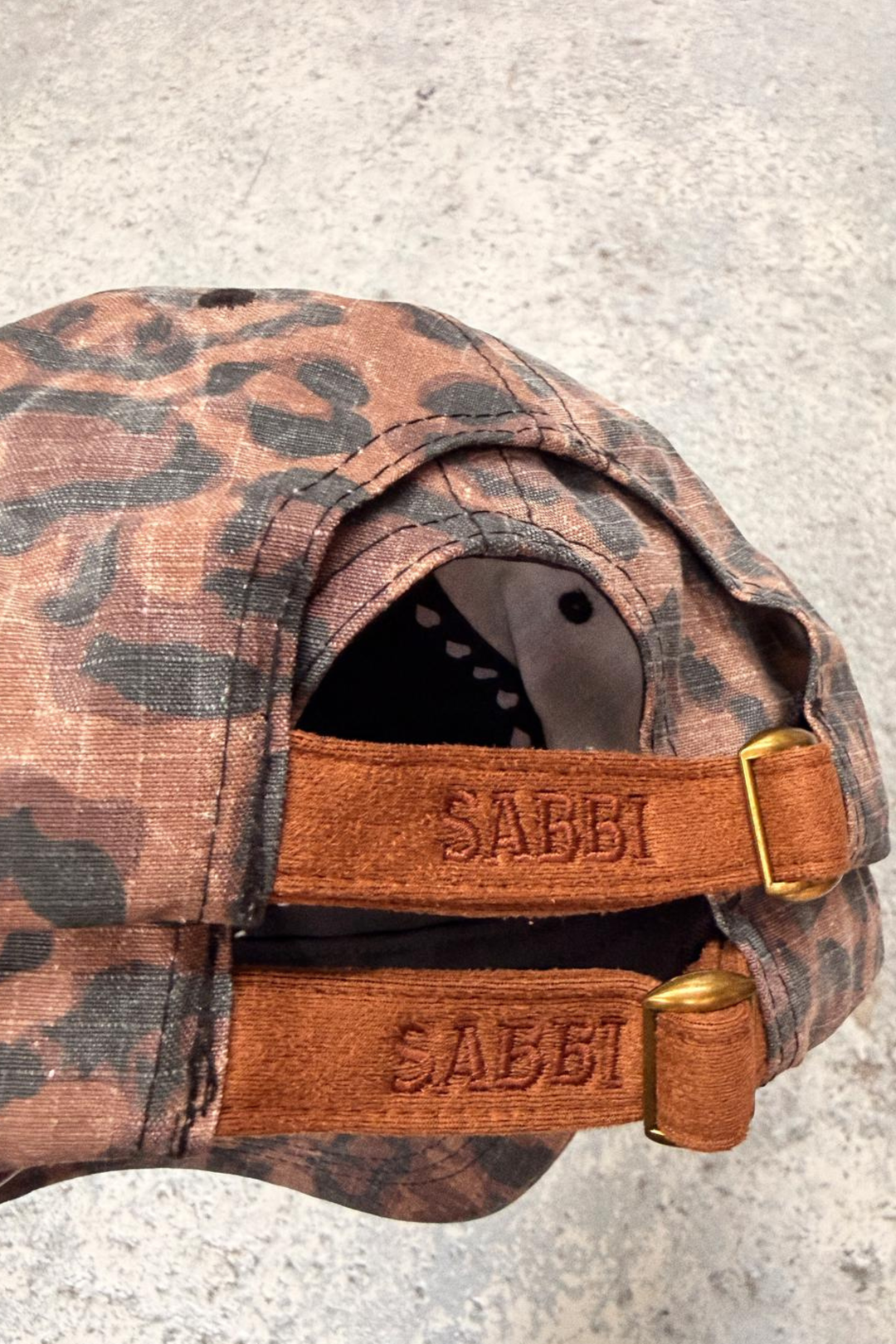 THE WHO THE BUCK CARES CAP