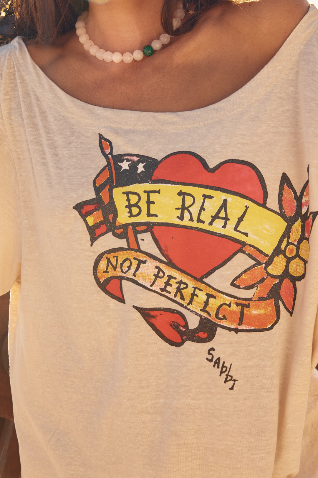 BAD TO THE BONE OFF THE SHOULDER TEE - SAND