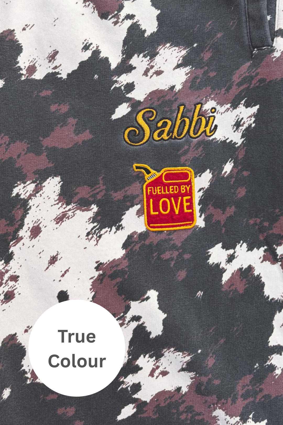 THE COW PRINT CUFFED SWEAT PANTS