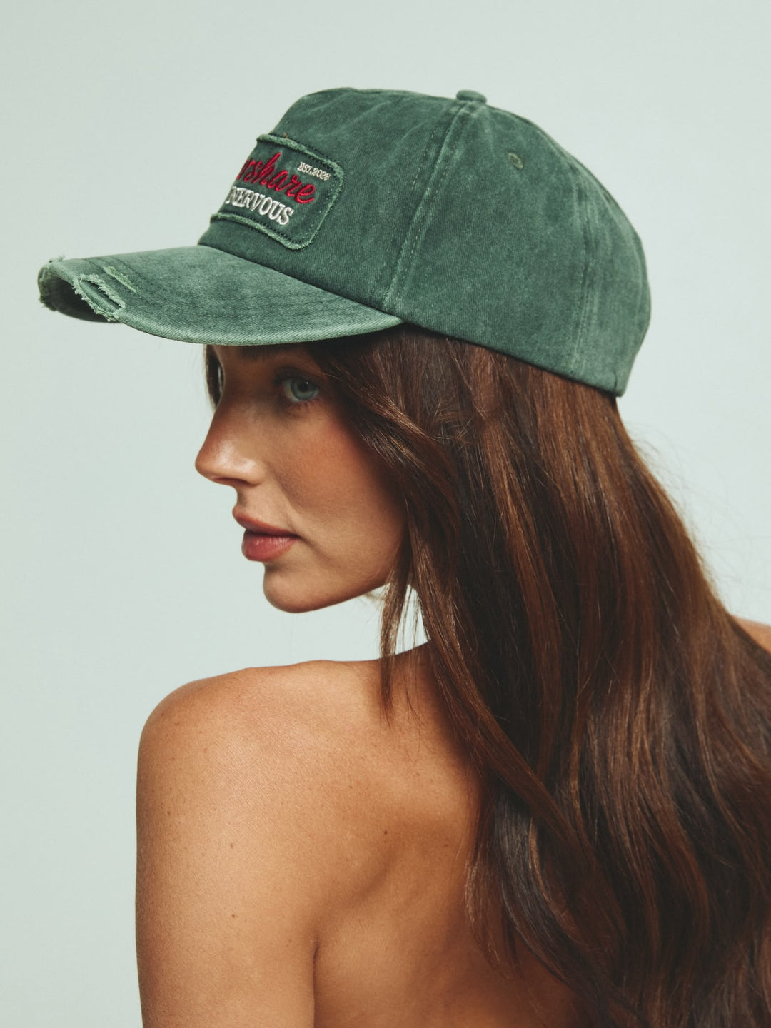 THE OVERSHARE CAP