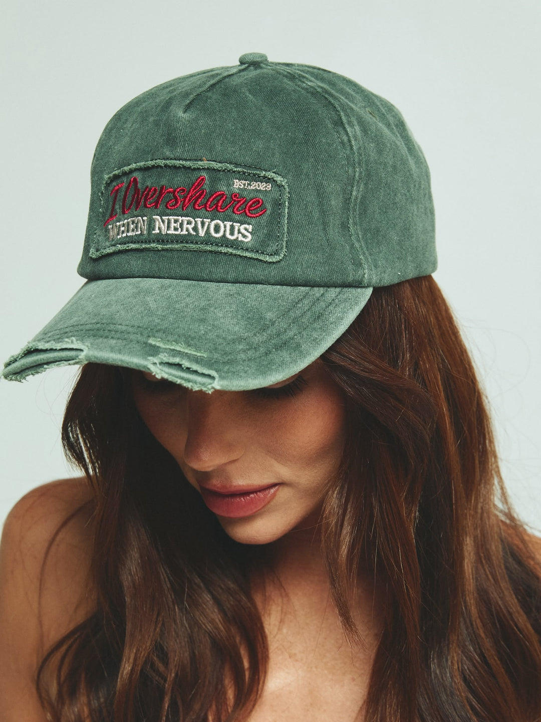 THE OVERSHARE CAP